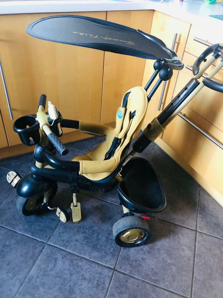 smart trike black and gold